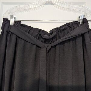 Stretchy waisted pants with self belt